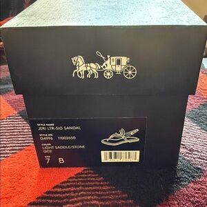Coach Jeri Sandals in box. Dark tan. Like new